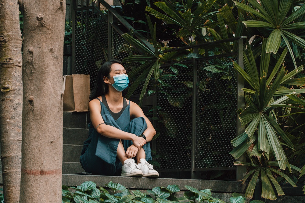 girl explores forest bathing in singapore